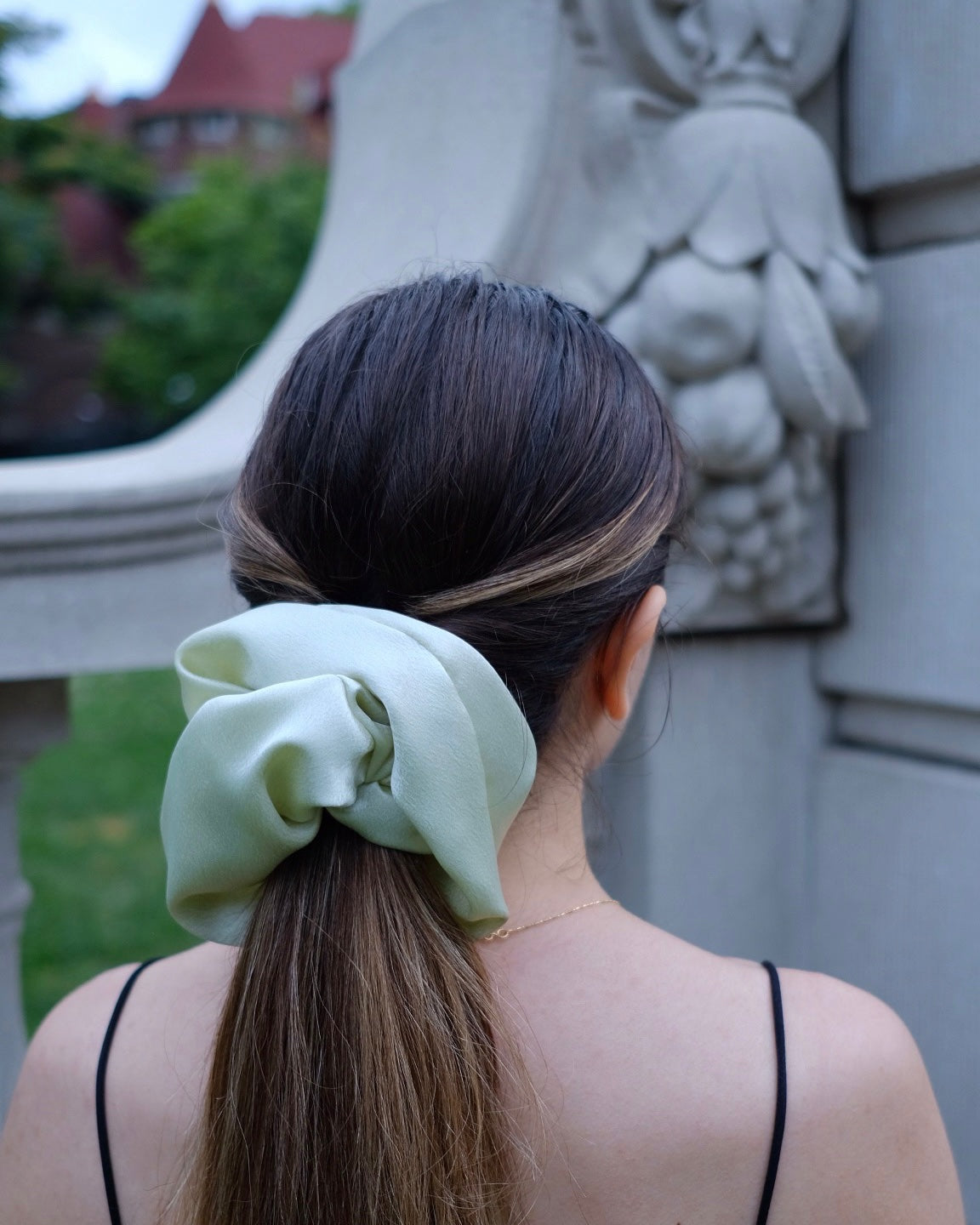 the perfect hair accessory! oversized scrunchie with a castle in the background 